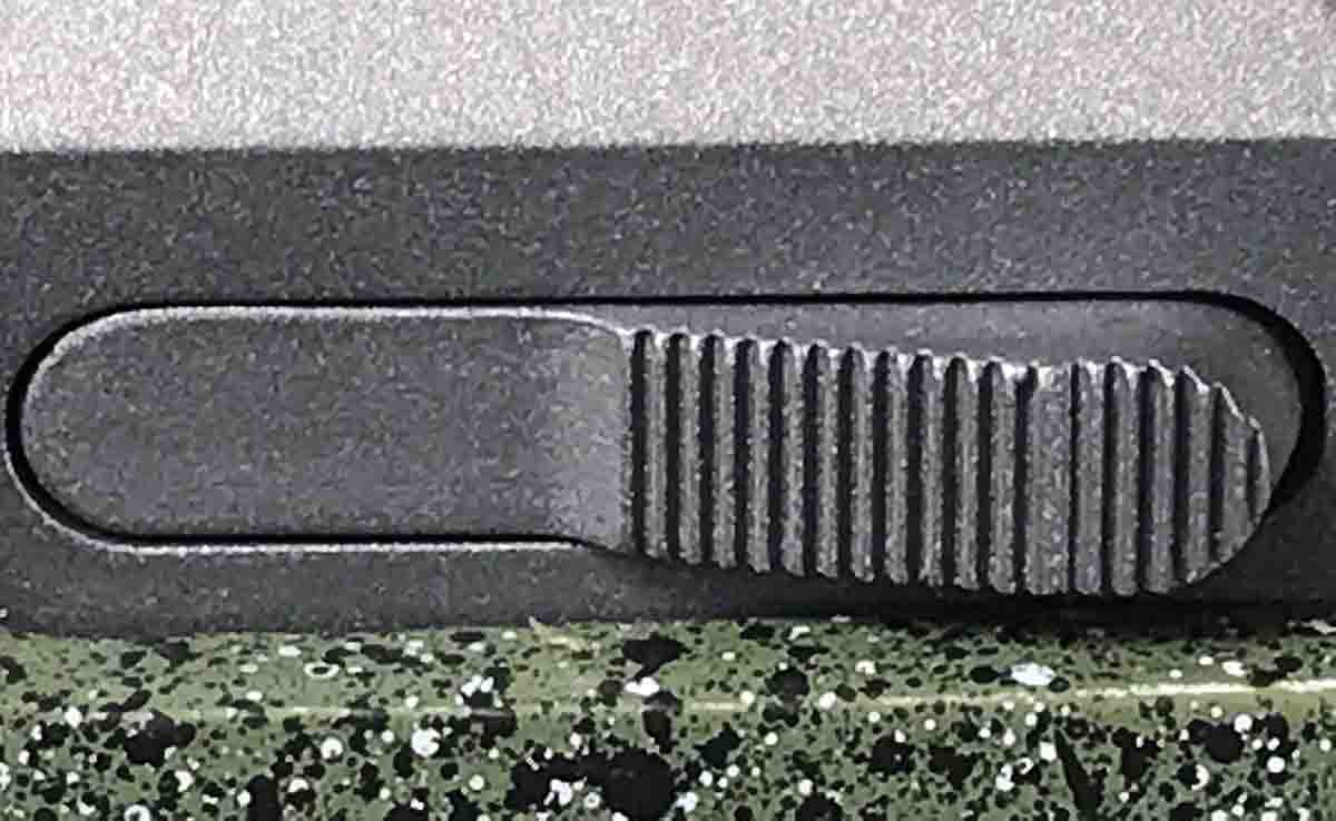 The bolt release is located on the left rear of the receiver.